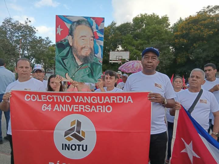Representantes de los trabajadores de la Dirección del OTU en Báguanos, Holguín en la  actividad por el 1 de Mayo 2025.